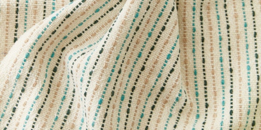 Little Looms Spring 2023 Call for Submissions: The Weaver’s Handshake Image